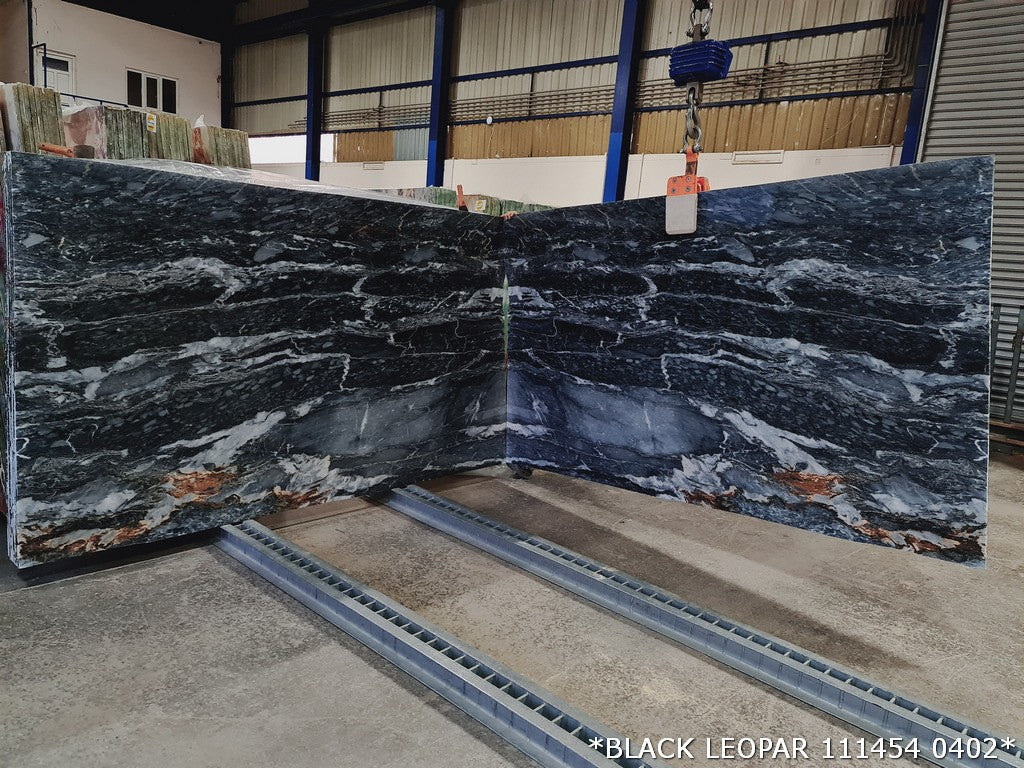 Black leopard inspired pattern on premium marble slabs showcasing elegance and durability for upscale interior design