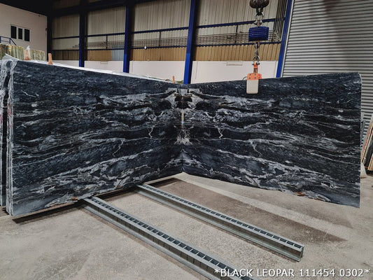 Black leopard inspired pattern on premium marble slabs showcasing elegance and durability for upscale interior design