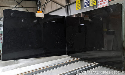 Black Pearl marble slabs showcasing elegant dark hues and natural veining, perfect for luxurious interior designs.