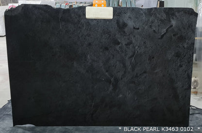 Black Pearl marble slabs showcasing elegant dark hues and natural veining, perfect for luxurious interior designs.