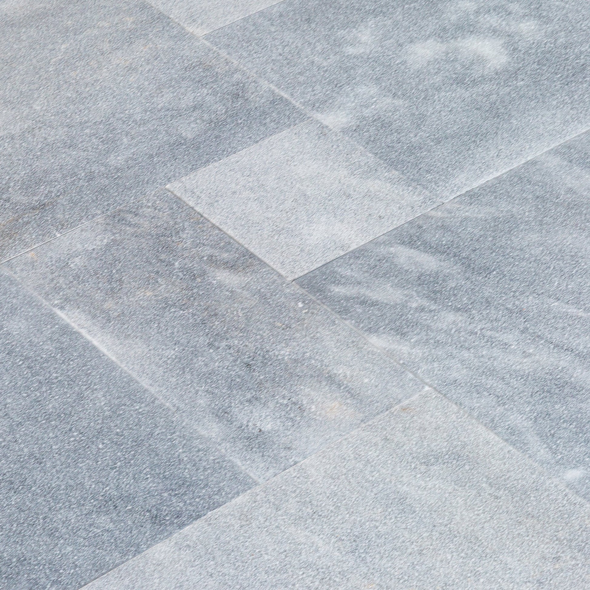High-quality Bluestone and Marble tiles showcasing elegant natural stone textures for premium interior and exterior design