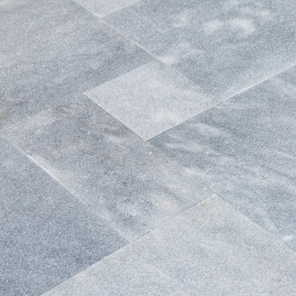 High-quality Bluestone and Marble tiles showcasing elegant natural stone textures for premium interior and exterior design