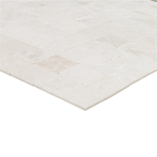 Elegant Botticino marble surface showcasing natural patterns and luxurious texture ideal for premium interior design.