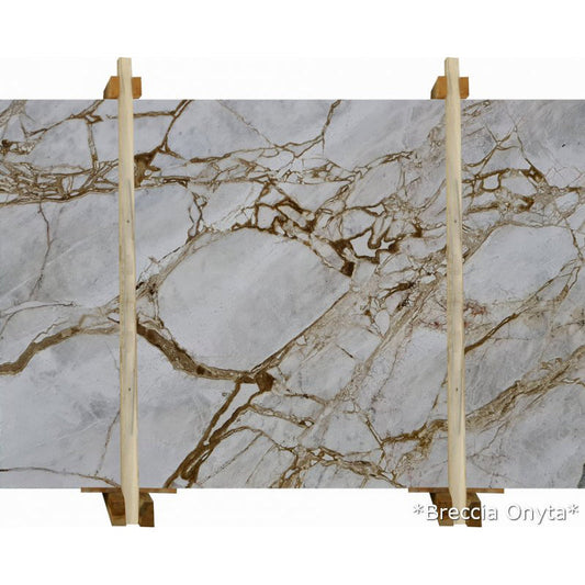 Elegant breccia marble surface showcasing natural stone patterns ideal for luxury interior design and architectural projects.