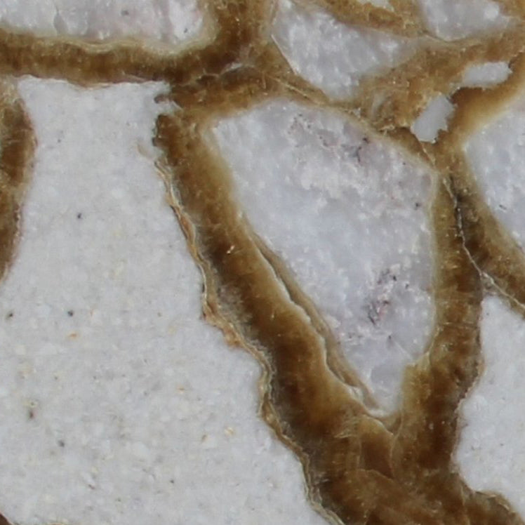Elegant breccia marble surface showcasing natural stone patterns ideal for luxury interior design and architectural projects.