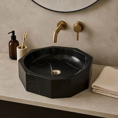 Geometric black marble vessel sink with polished finish and clean lines, featuring minimalist design for modern bathrooms.