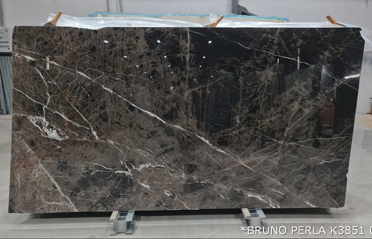 Elegant Bruno Perla design featuring luxurious brown marble surface with polished finish, perfect for upscale interiors.
