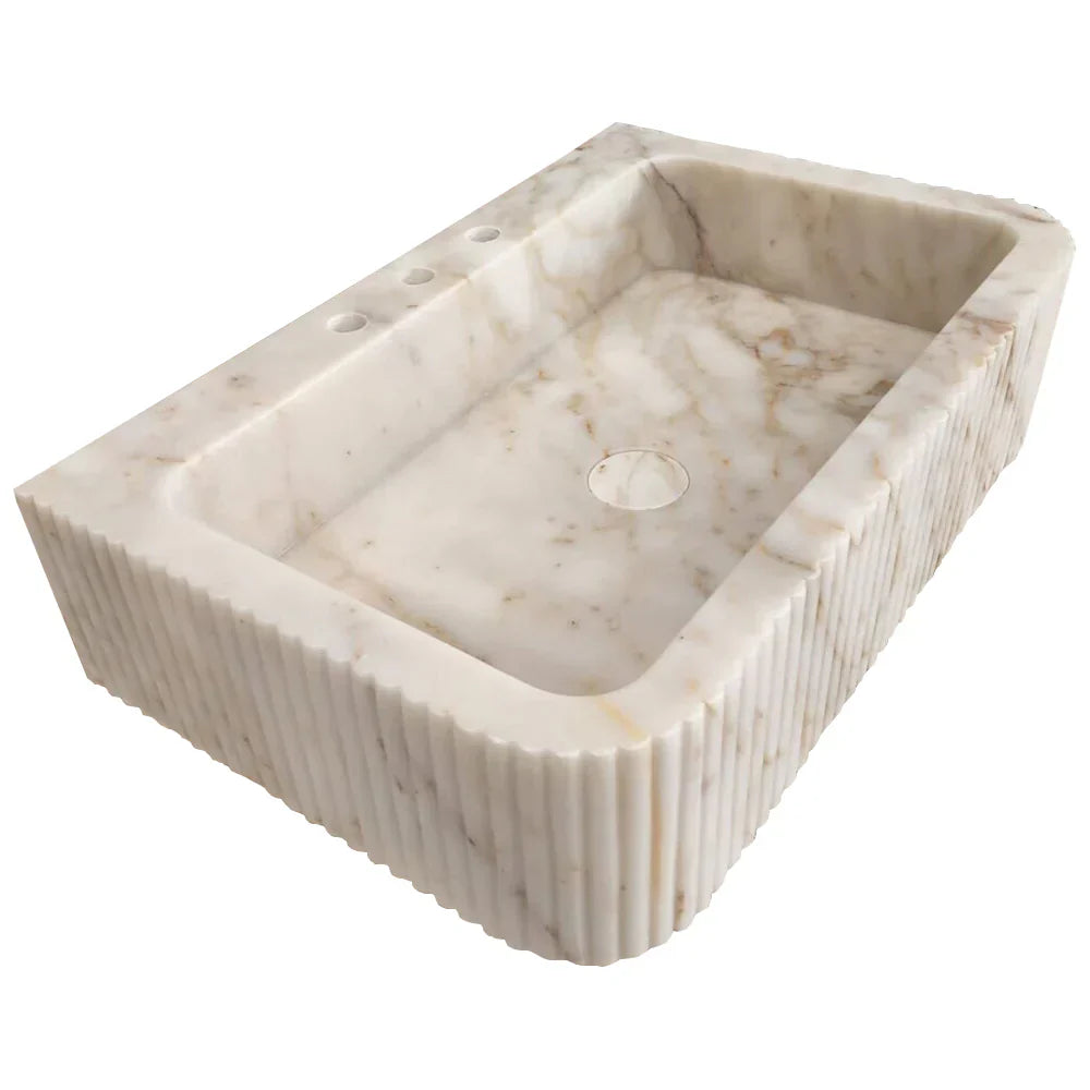 Elegant Calacatta Gold wall-mount vanity sink enhancing bathroom aesthetics with luxurious marble finish
