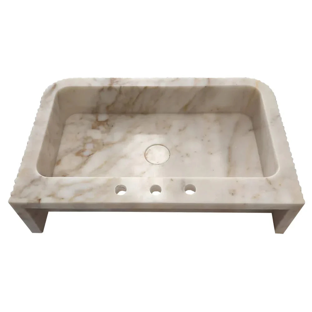 Elegant Calacatta Gold wall-mount vanity sink enhancing bathroom aesthetics with luxurious marble finish