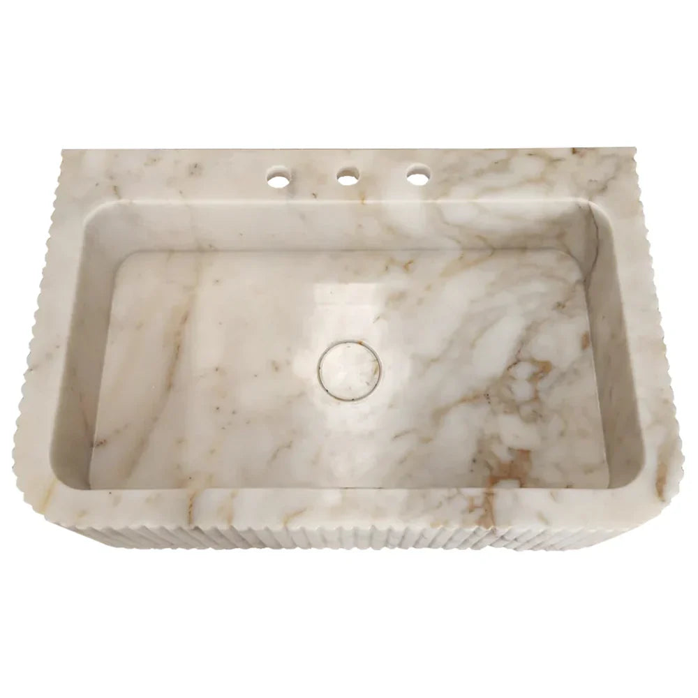 Elegant Calacatta Gold wall-mount vanity sink enhancing bathroom aesthetics with luxurious marble finish