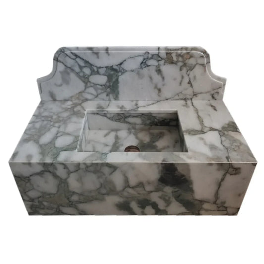 Sleek wall-mount sink featuring elegant Calacatta Verde marble design for modern bathroom aesthetics