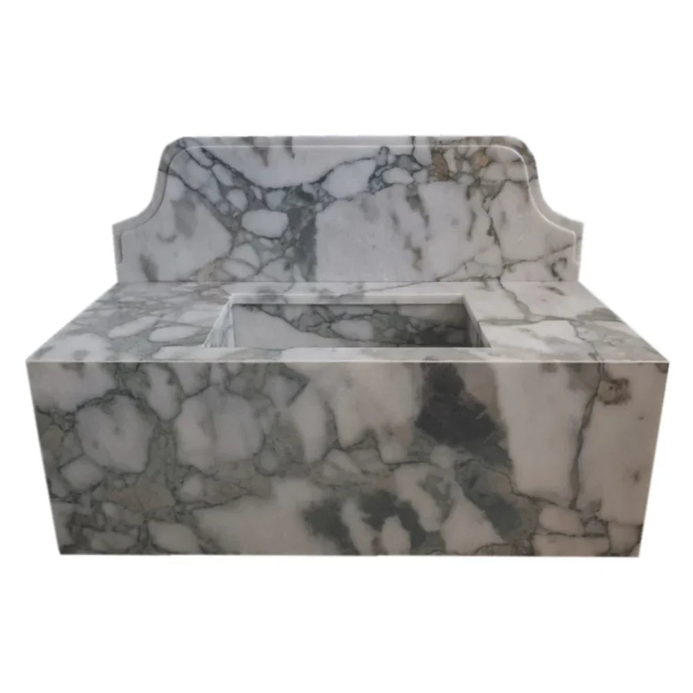 Sleek wall-mount sink featuring elegant Calacatta Verde marble design for modern bathroom aesthetics