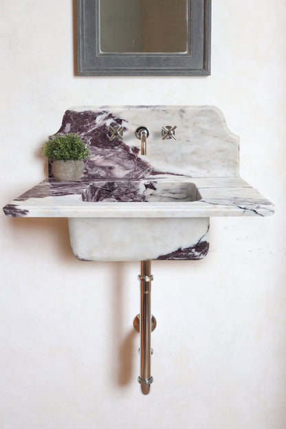 Calacatta Viola marble bathroom sink with elegant veining for a luxurious and stylish bath space.