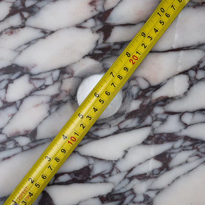 Calacatta Viola wall-mount sink showcasing elegant marble design for modern bathroom aesthetics