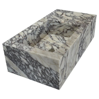 Calacatta Viola marble sink showcasing elegant natural veining and luxurious stone craftsmanship