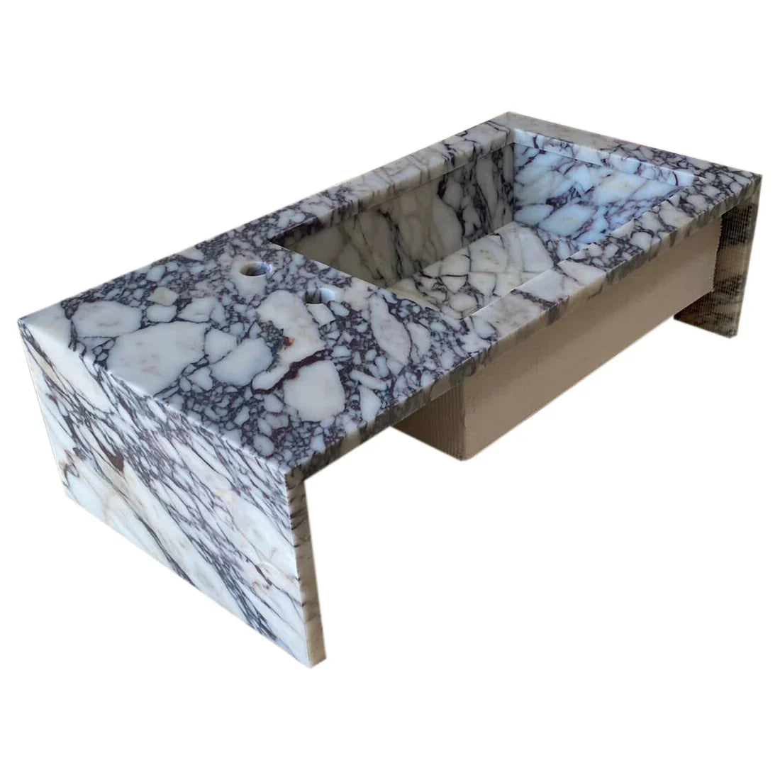 Calacatta Viola marble sink showcasing elegant natural veining and luxurious stone craftsmanship