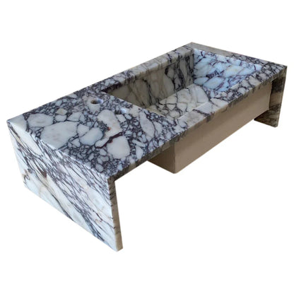 Calacatta Viola marble sink showcasing elegant natural veining and luxurious stone craftsmanship