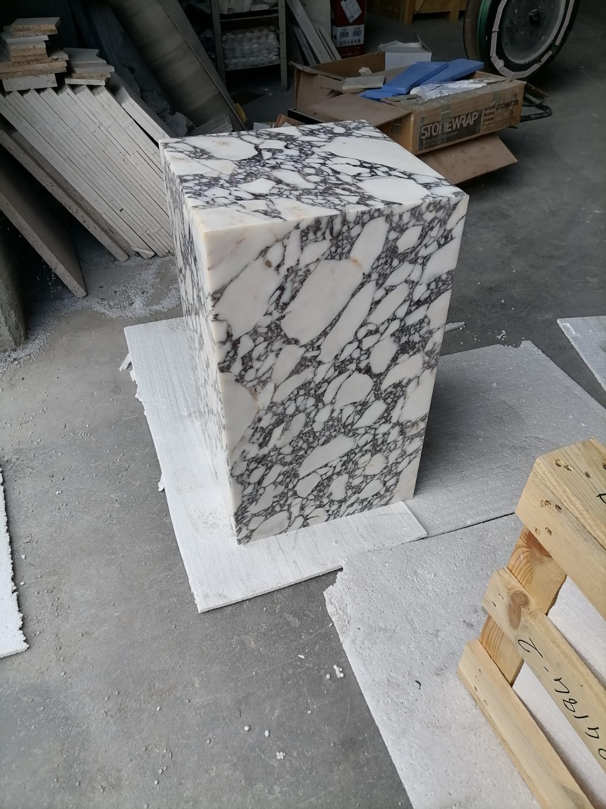 Elegant Calacatta marble nightstand with sleek design, perfect for modern bedroom decor and functional style.