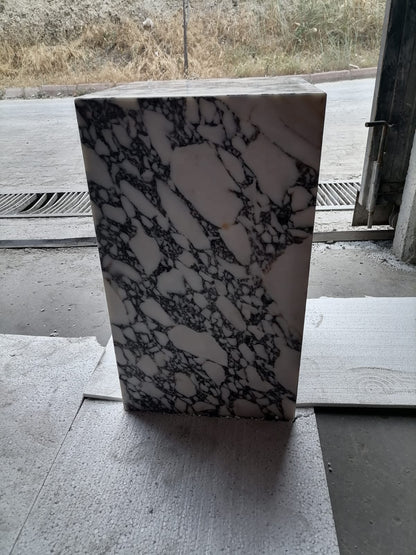Elegant Calacatta marble nightstand with sleek design, perfect for modern bedroom decor and functional style.