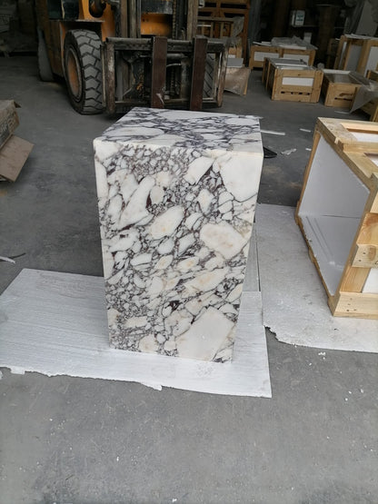 Elegant Calacatta marble nightstand with sleek design, perfect for modern bedroom decor and functional style.