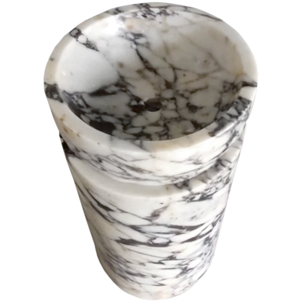 Elegant Calacatta marble surface showcasing natural veining patterns ideal for luxury interior design