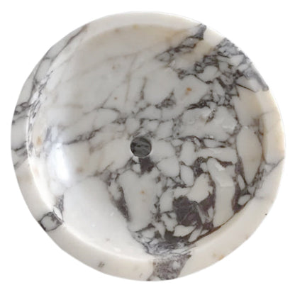 Elegant Calacatta marble surface showcasing natural veining patterns ideal for luxury interior design