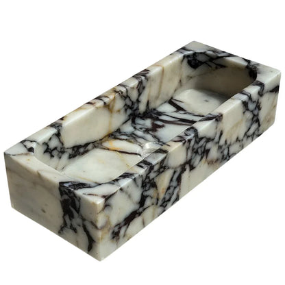 Calacatta Viola marble sink showcasing elegant purple veining, perfect for luxury bathroom designs