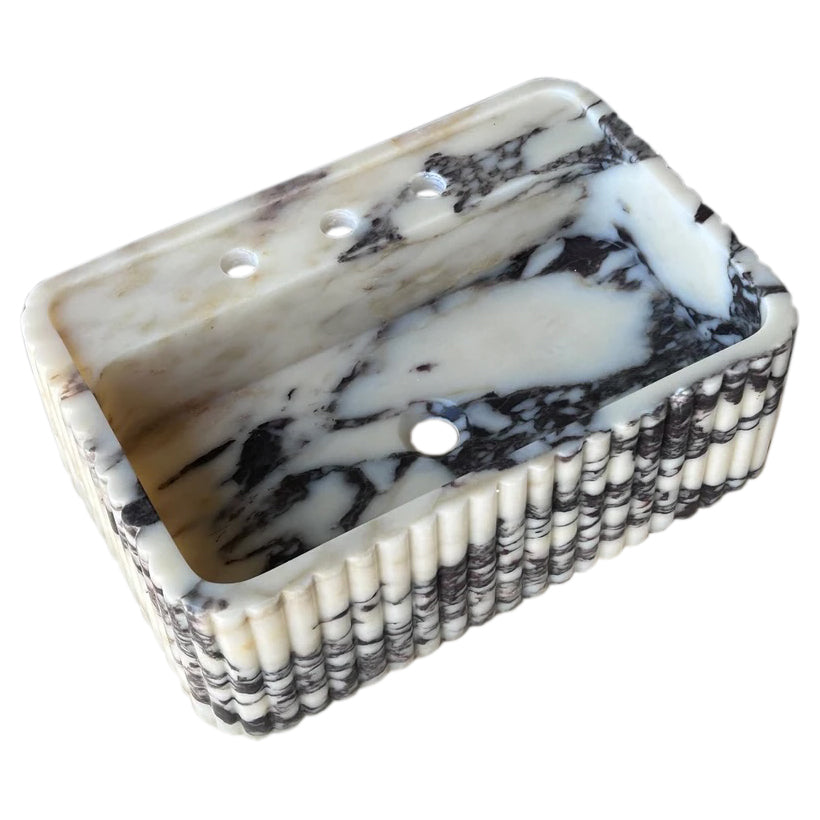 Calacatta Viola wall-mount sink featuring elegant marble design for modern bathrooms