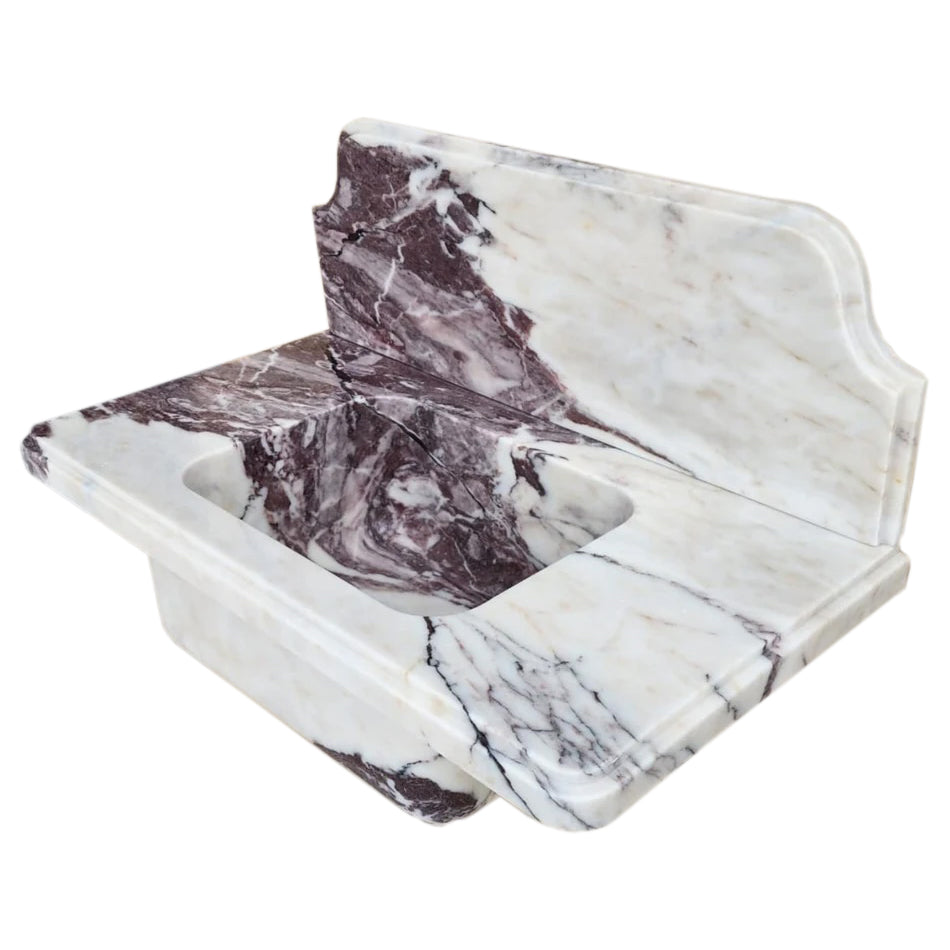 Calacatta Viola marble bathroom sink with elegant veining for a luxurious and stylish bath space.