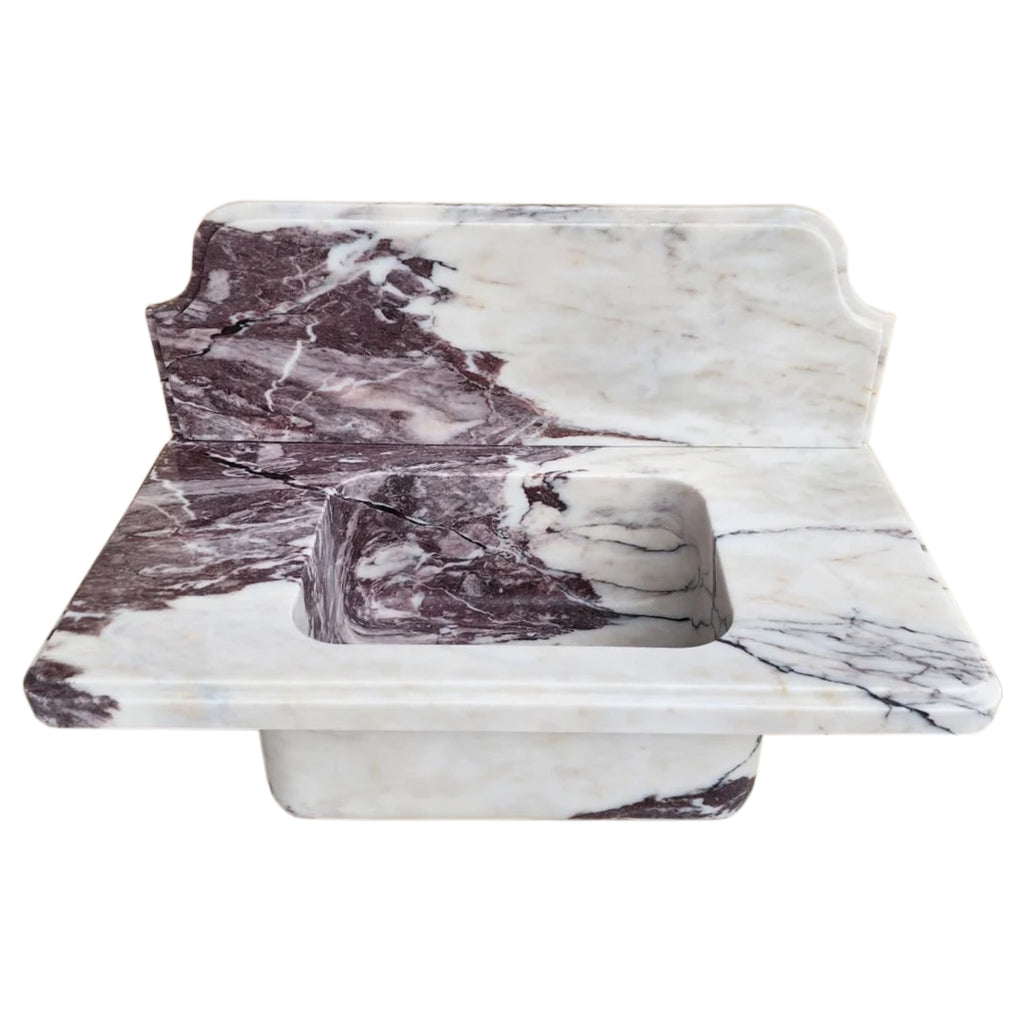 Calacatta Viola marble bathroom sink with elegant veining for a luxurious and stylish bath space.