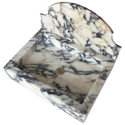 Elegant Calacatta Viola wall-mount sink showcasing luxurious marble design for modern bathrooms