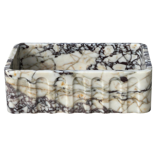 Calacatta Viola wall-mount vanity showcasing elegant marble design for luxurious bathroom decor