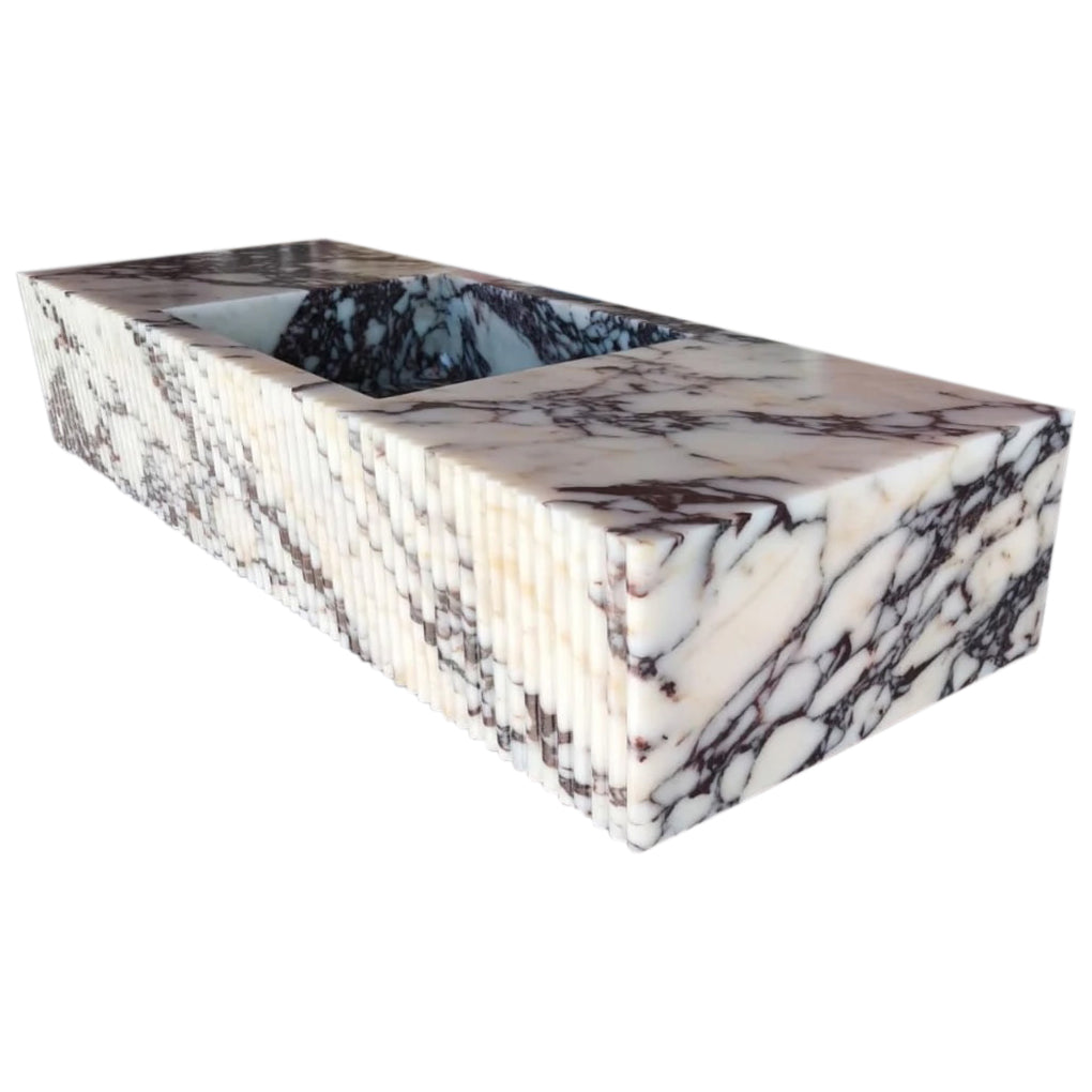 Elegant Calacatta Viola marble vanity showcasing luxurious natural stone for sophisticated bathroom design.