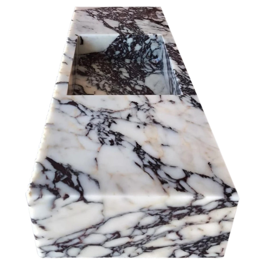 Elegant Calacatta Viola marble vanity showcasing luxurious natural stone for sophisticated bathroom design.