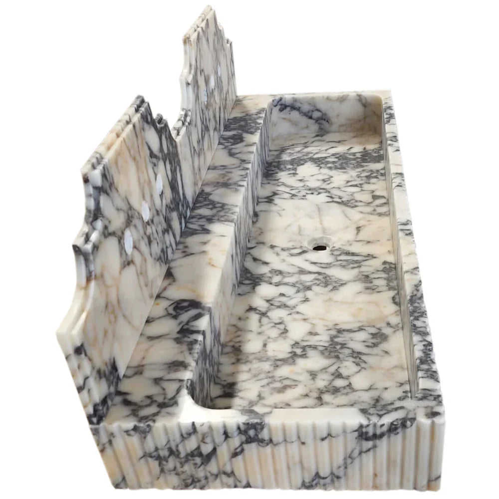 Elegant Calacatta Viola wall-mount sink featuring luxurious marble design for modern bathroom aesthetics