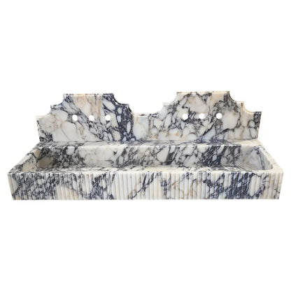 Elegant Calacatta Viola wall-mount sink featuring luxurious marble design for modern bathroom aesthetics