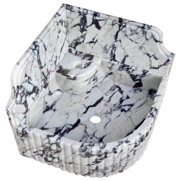 Elegant Calacatta Viola marble corner sink ideal for modern bathroom designs with luxurious stone finish.