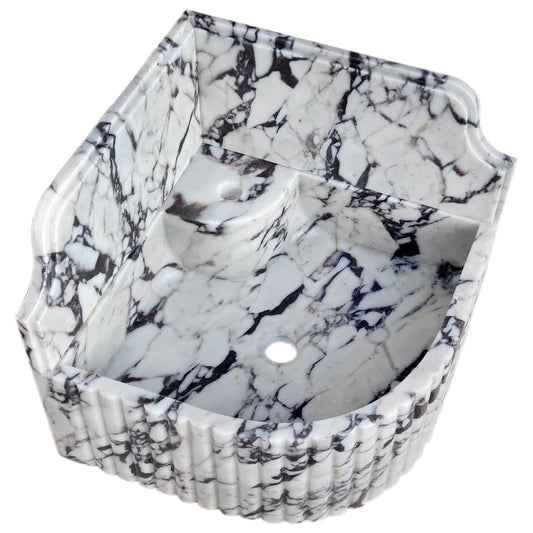 Elegant Calacatta Viola marble corner sink ideal for modern bathroom designs with luxurious stone finish.