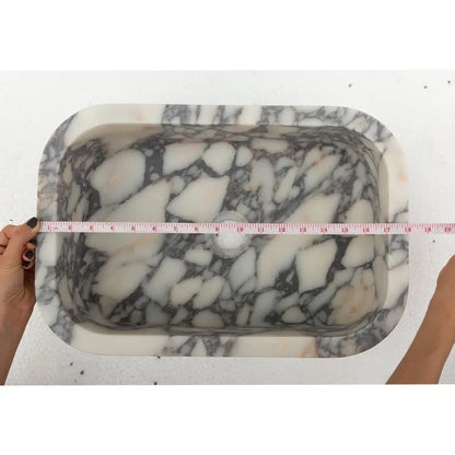 Calacatta Viola wall-mount sink with elegant marble design, perfect for modern bathroom decor
