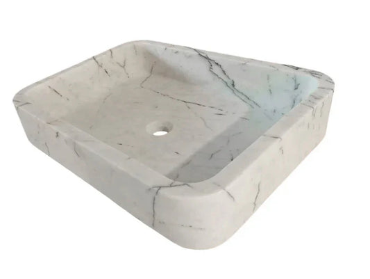 Elegant Carrara White marble sink featuring smooth craftsmanship and timeless design for luxury bathrooms