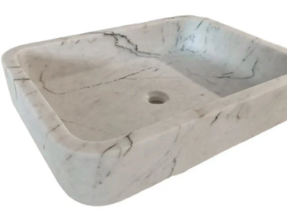 Elegant Carrara White marble sink featuring smooth craftsmanship and timeless design for luxury bathrooms