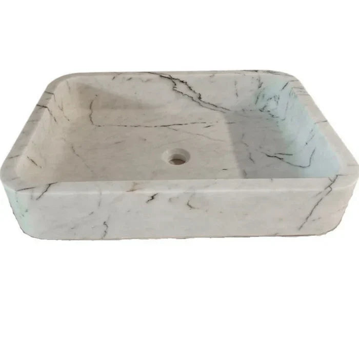 Elegant Carrara White marble sink featuring smooth craftsmanship and timeless design for luxury bathrooms
