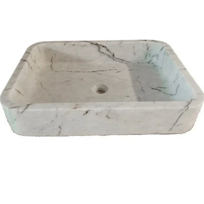 Elegant Carrara White marble sink featuring smooth craftsmanship and timeless design for luxury bathrooms
