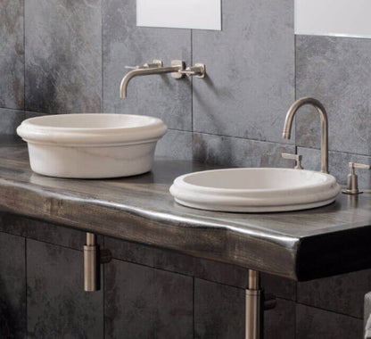 Elegant Carrara marble vanity sink showcasing timeless design and durable craftsmanship for luxury bathrooms.