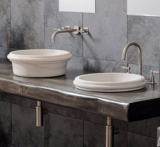Elegant Carrara marble vanity sink showcasing timeless design and durable craftsmanship for luxury bathrooms.