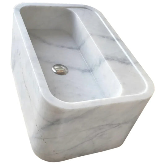 Elegant Carrara marble wall-mount sink showcasing timeless design and superior craftsmanship for modern bathroom interiors