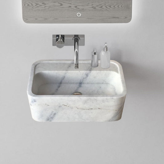 Elegant Carrara marble wall-mount sink showcasing timeless design and superior craftsmanship for modern bathroom interiors