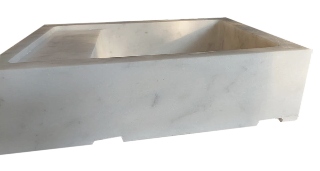 Elegant Carrara Marble surface exemplifying luxury and timeless sophistication in premium interior design.