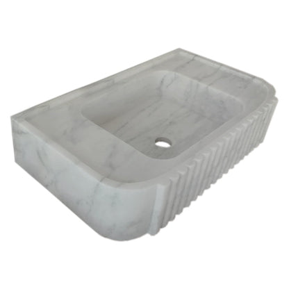 Elegant Carrara Marble vanity sink showcasing timeless luxury and sophisticated bathroom design.