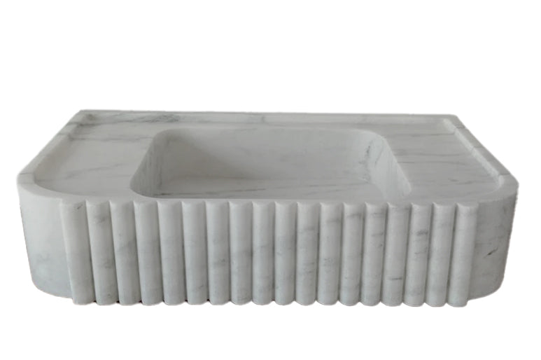 Elegant Carrara Marble vanity sink showcasing timeless luxury and sophisticated bathroom design.